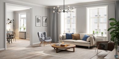 Modern living room with neutral tones and natural light.