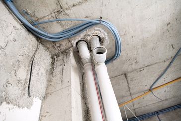 Modern water filtration and heating system with copper piping.