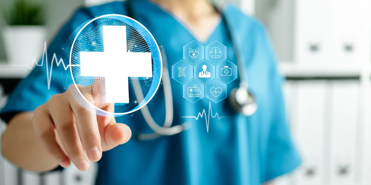 A doctor in blue scrubs and a stethoscope, touching a holographic interface