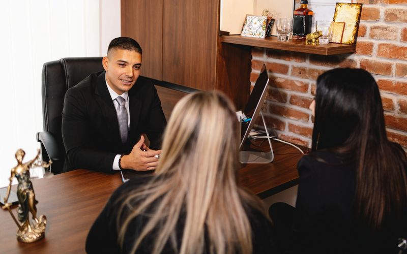 Discussing legal issues at the lawyer office