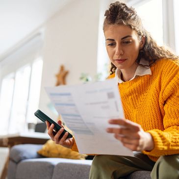 Homeowner paying association dues online from a smartphone