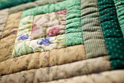 Colorful quilt fabrics and tools supporting kids in need through quilting.