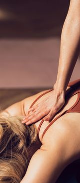 Person receiving a back massage.