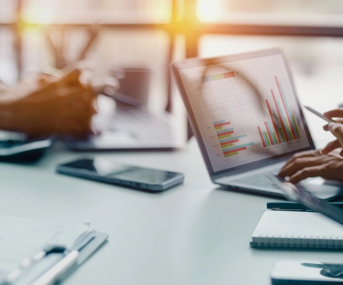 A person is using a laptop on the table