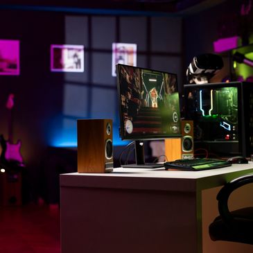 Gaming room with computer on desk