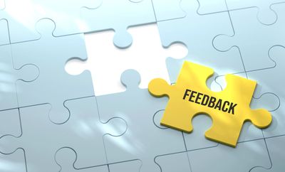 Yellow puzzle piece labeled 'FEEDBACK' fitting into a missing spot.