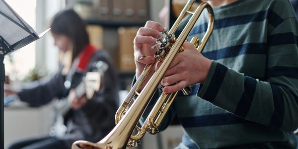 A person playing trumpet