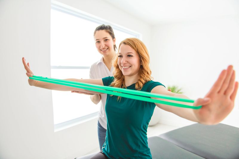 A Modern rehabilitation physiotherapy at work with client