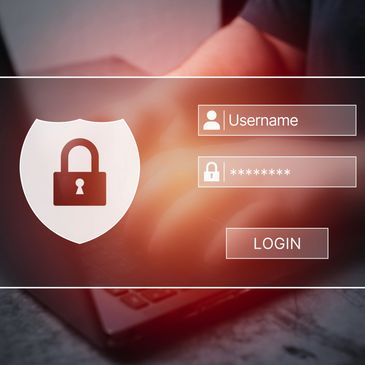 Secure login interface with username and password fields on a laptop. 