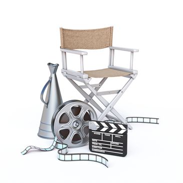 Director's chair, film reel, megaphone, and clapperboard on white background.