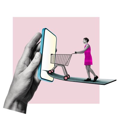 Woman with shopping cart emerging from smartphone.