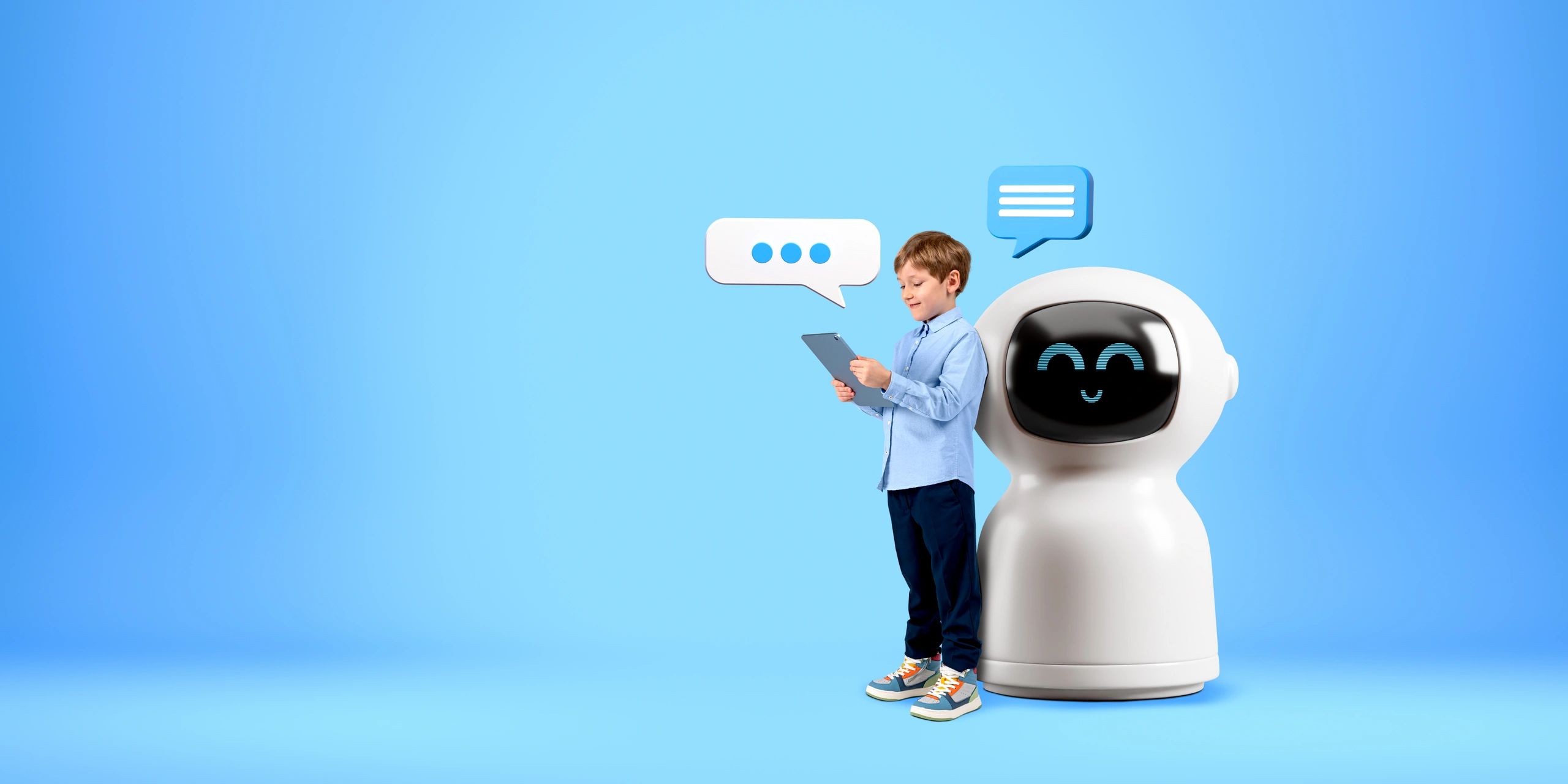 Young boy standing next to robot