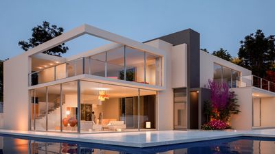 A two-story modern home with modern pool and oversized windows in Naples, FL by LeLack Construction