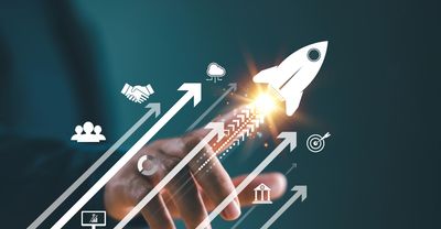 a rocket and other icons on a digital screen