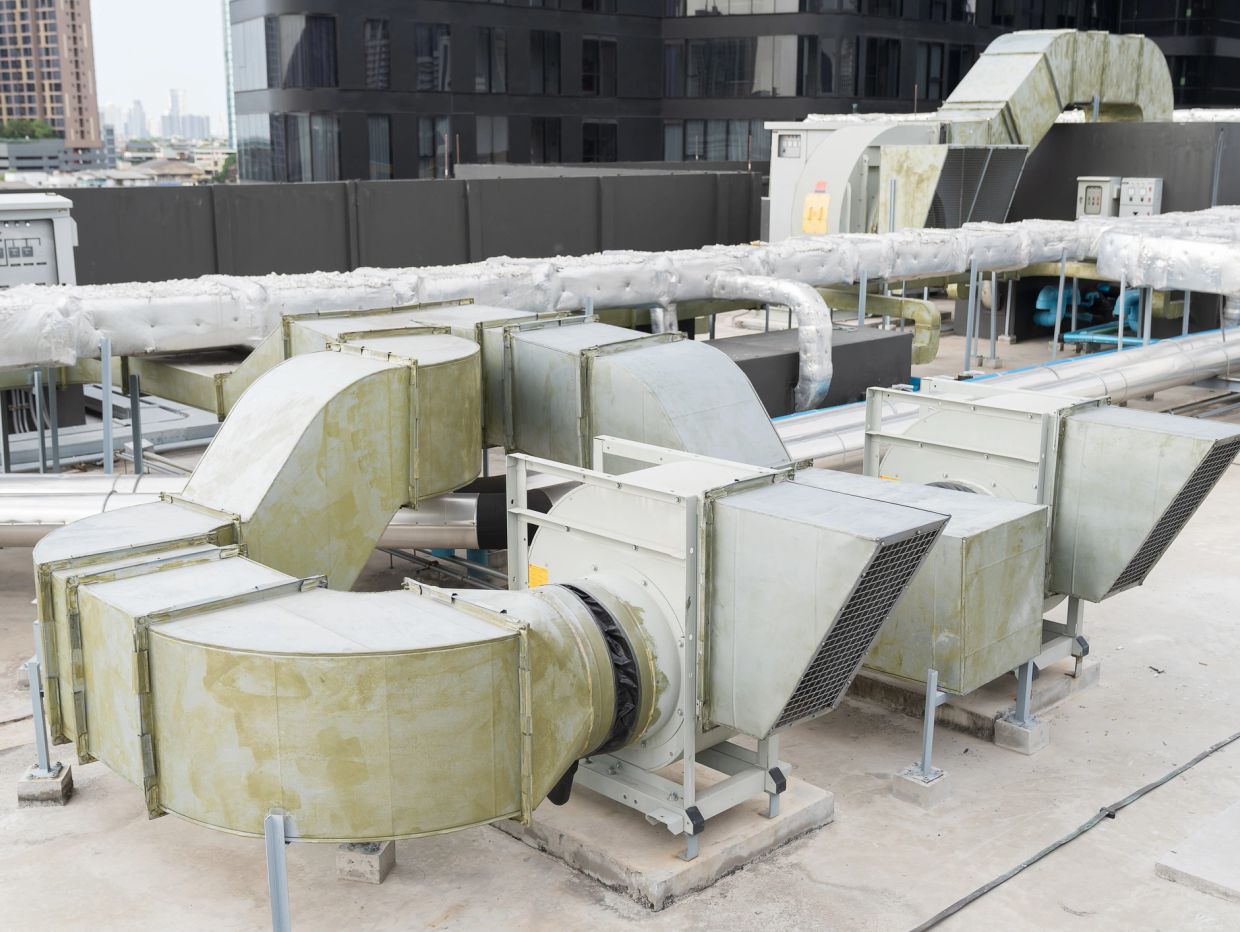 Industrial ventilation system on rooftop.