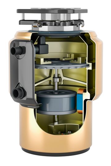 Cutaway view of a kitchen garbage disposal showing internal components.