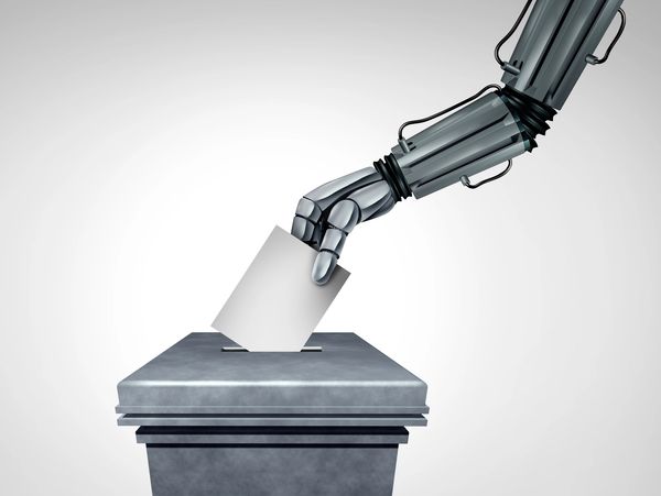 Robot arm casting a vote by placing a ballot in a box.