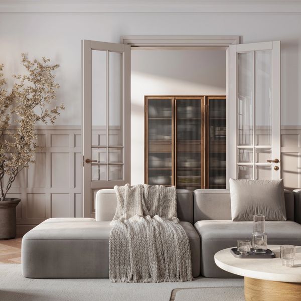 Cozy modern living room with neutral tones and elegant decor.