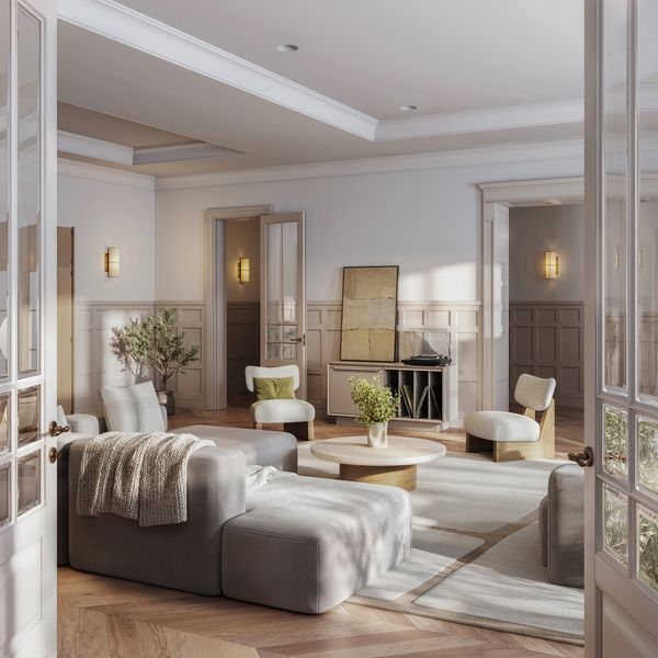 Bright, modern living room with minimalist furniture.