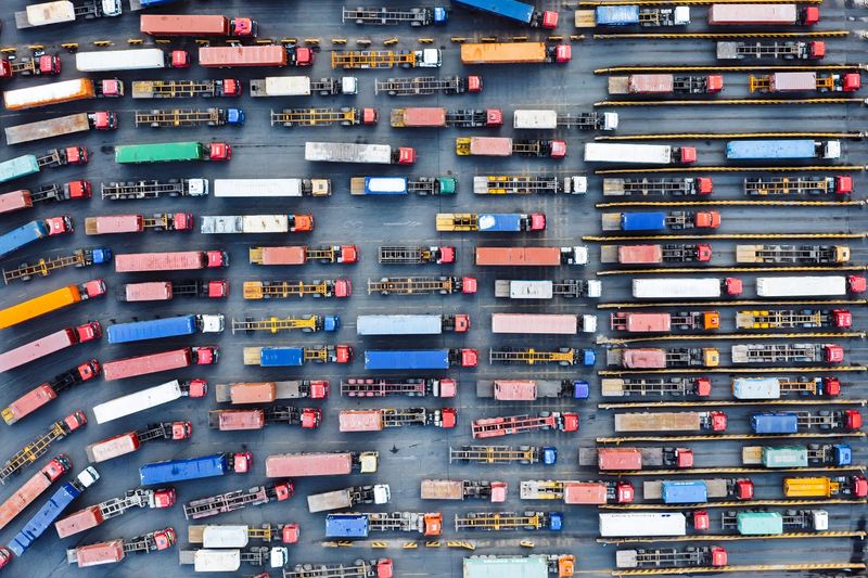 Aerial View of Trucks Entering Container Terminal