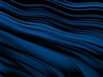 Blue flowing fabric with wavy patterns.