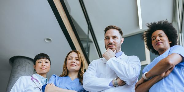 Confident healthcare team standing together.