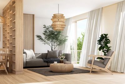 Bright modern living room with wooden accents and indoor plants.