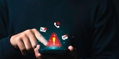 A user tapping a phone link as hidden malware installs silently in the background.