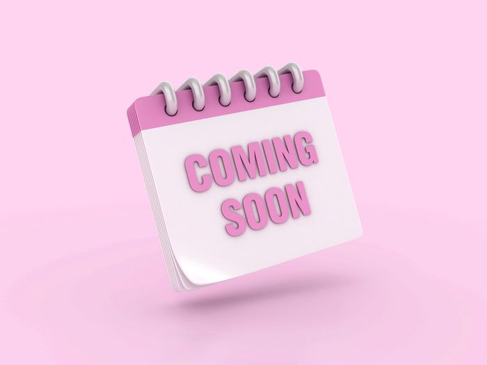 Pink notepad with "COMING SOON" text on a pastel background.