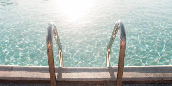 a swimming pool with clear water 
