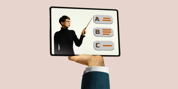 Hand holding a tablet showing a woman teaching multiple-choice options.