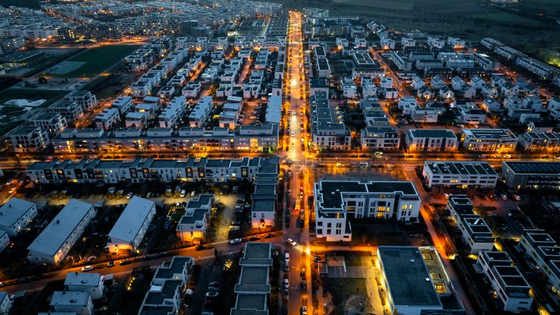 Aerial view over Frankfurt Riedberg and Mertonviertel at dusk. Frankfurt-Riedberg is a newly developed city district in the north of Frankfurt, Germany.