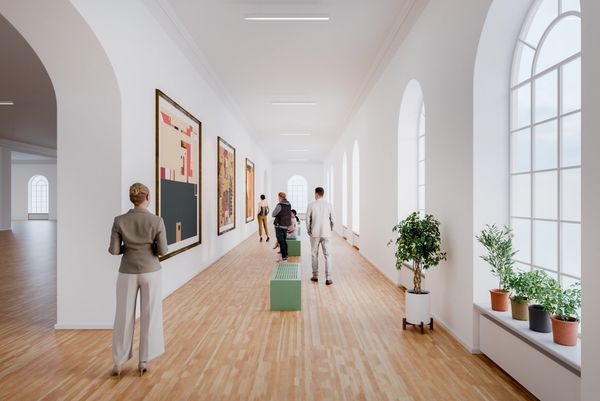 People viewing art in a bright, modern gallery with large windows.