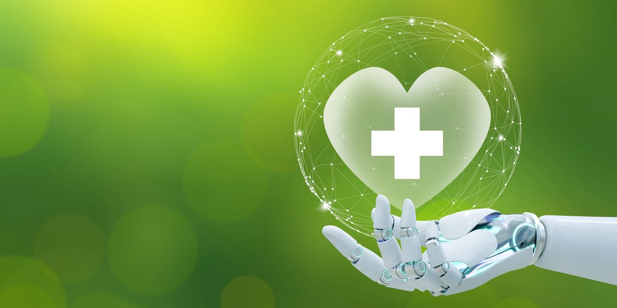 Robotic hand holding a health symbol heart with a medical cross.