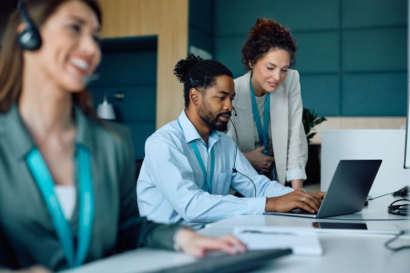African American businessman and his female colleague cooperating