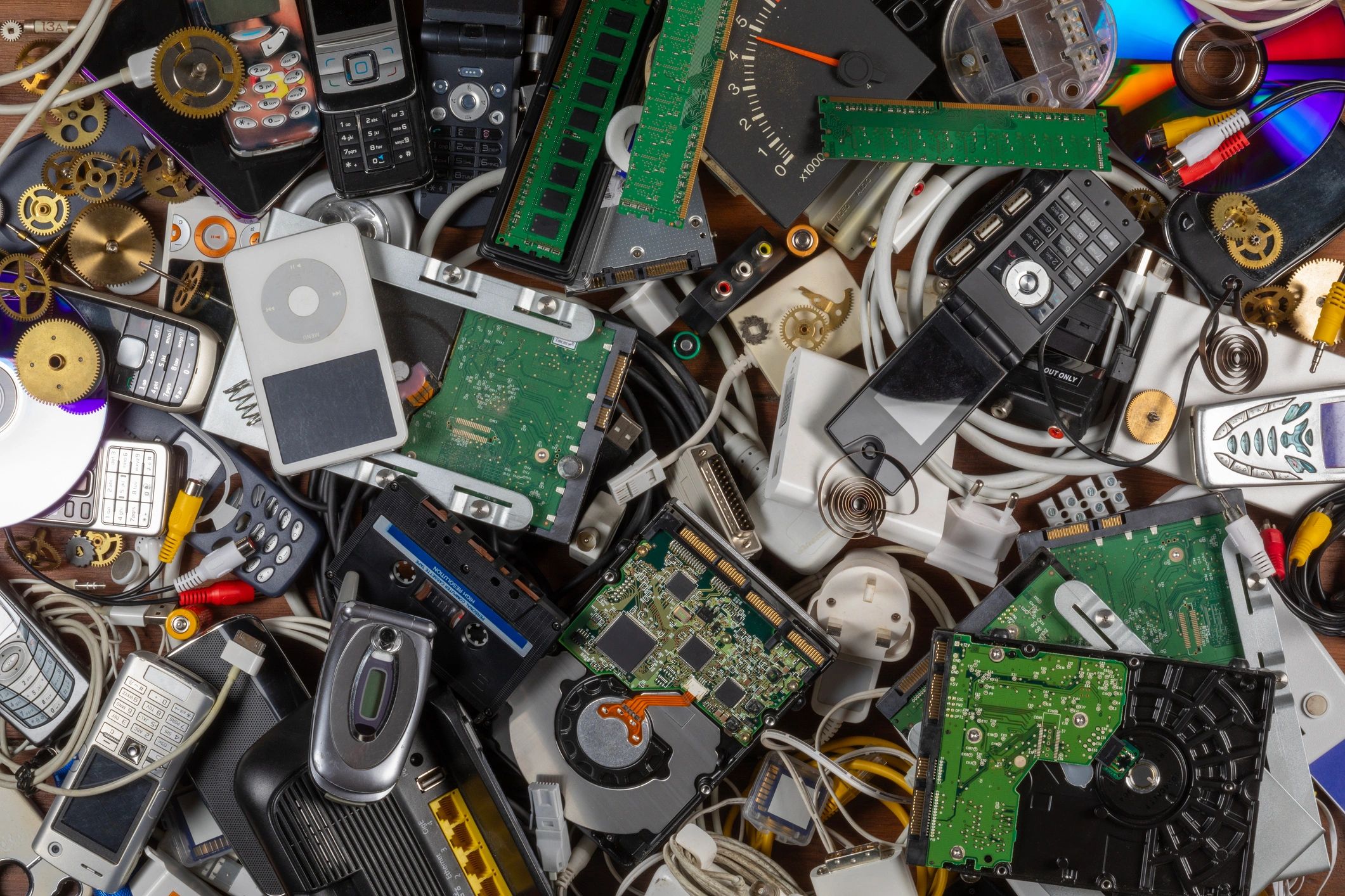 Pile of various old electronic devices and components.