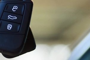 Car key fob with lock and trunk buttons.