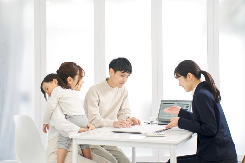 A family receiving information about insurance