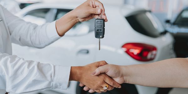 A customer recieving canadian money for his car