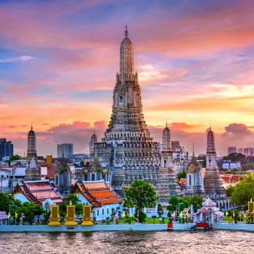 Wat Arun temple at sunset in Bangkok, Thailand.