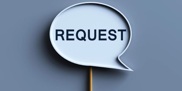 Speech bubble with the word REQUEST on a stick.