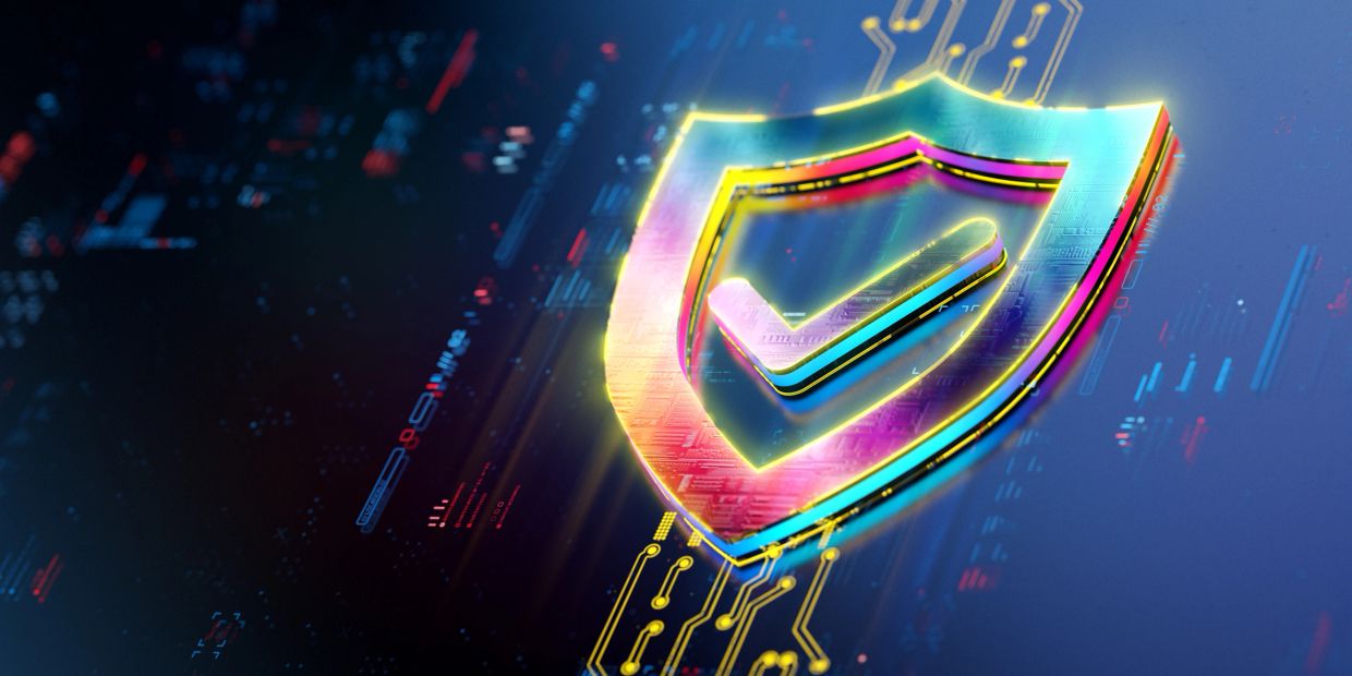 Glowing shield with checkmark symbolizing cybersecurity and digital protection.