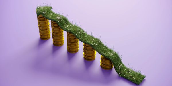 A downward graph made of grass on gold coin columns against a purple background.