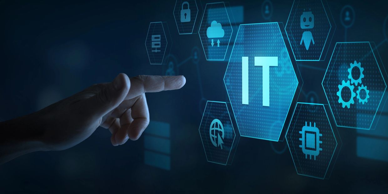 Hand interacting with digital IT icons on a futuristic interface.