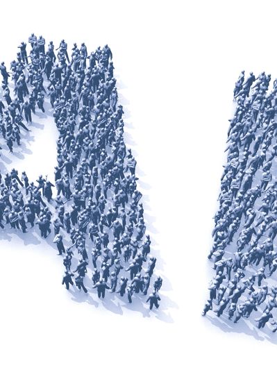 People forming the letters AI in a crowd.