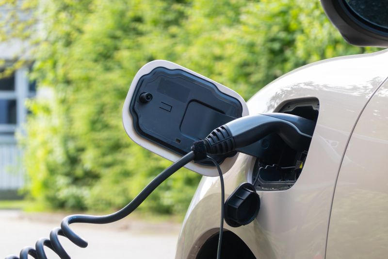 Eco electricity charging office complex background