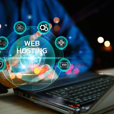 Web hosting concept with digital icons above laptop keyboard.