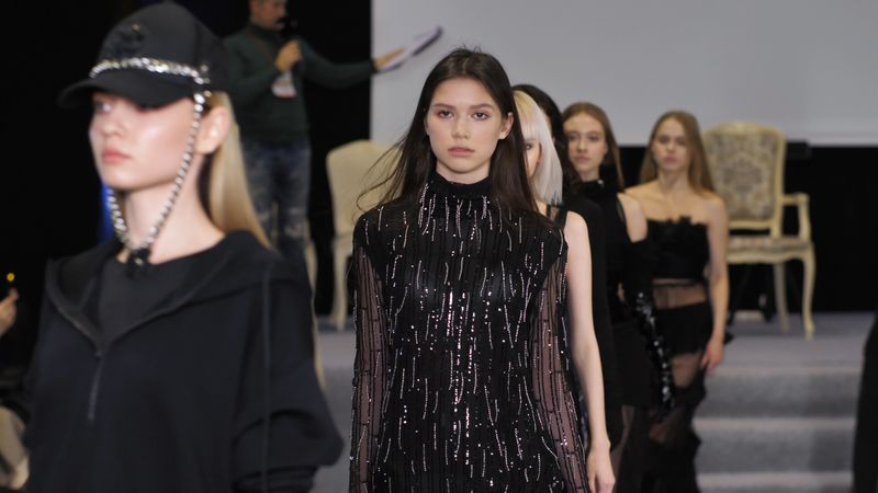 Stylish glamour girls move on pricy podiums during classy fashion showing weeks. Models defile on catwalk stage show. Young adult women walk in trendy clothing. Popular females on famous runways 4K.
