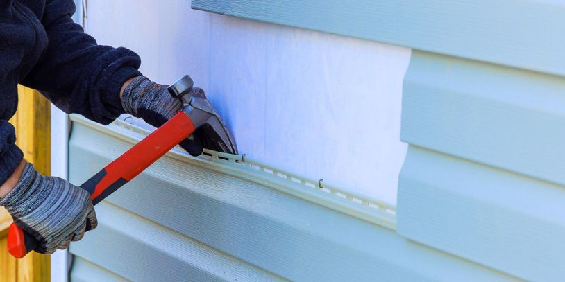 Vinyl siding installation on residential home in Cleveland Ohio by Barahona Roofing