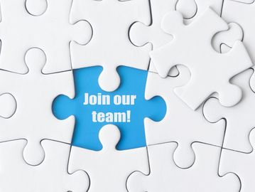 Puzzle piece with 'Join our team!' message.